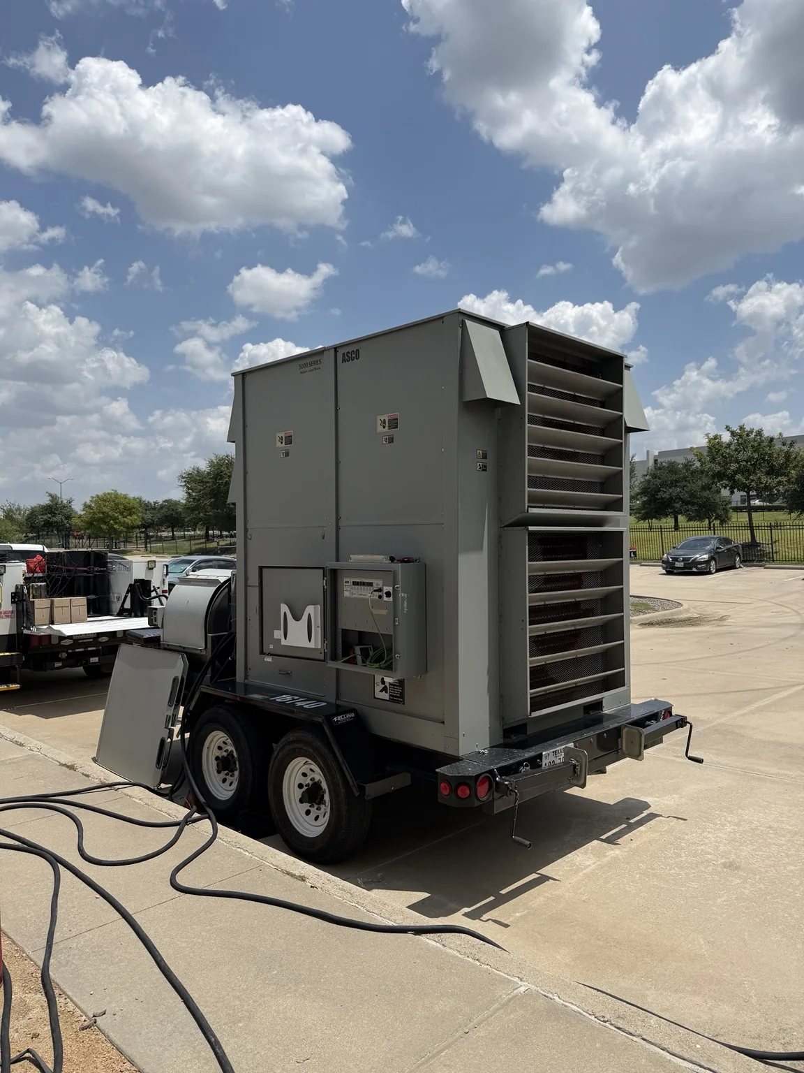Trailer-mounted commercial load bank staged for field service
